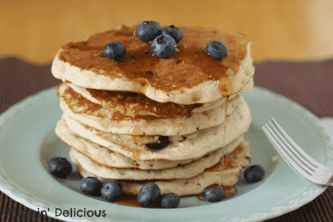 Sweet banana pancakes bursting with fresh blueberries. Best gluten-free breakfast around!
